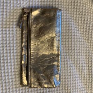 Clare V. Fold over Gold Clutch